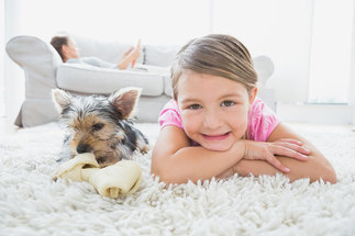 Girl and her dog on Carpet 